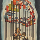 Esta caricatura muestra a Hitler y al emperador Hiroito derrotados y rodeados por las banderas de los Aliados.